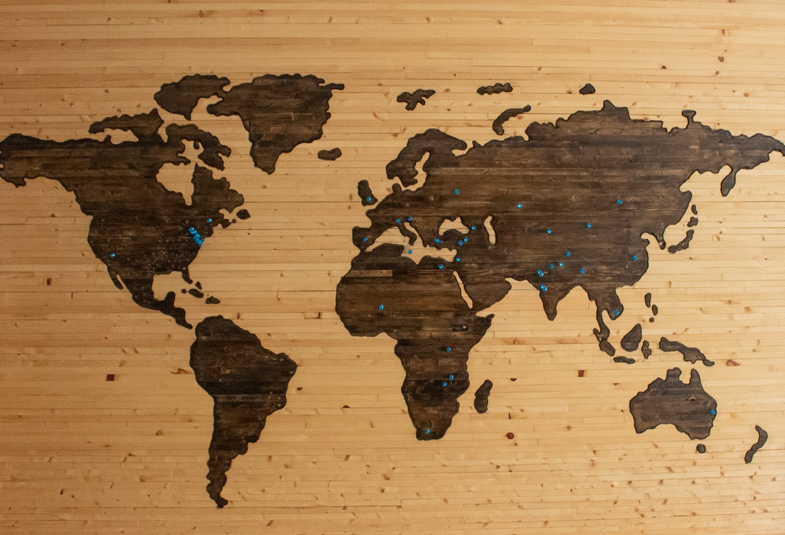 World map with pins — global reach across borders